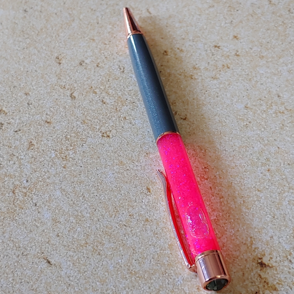Grey and bright pink pen